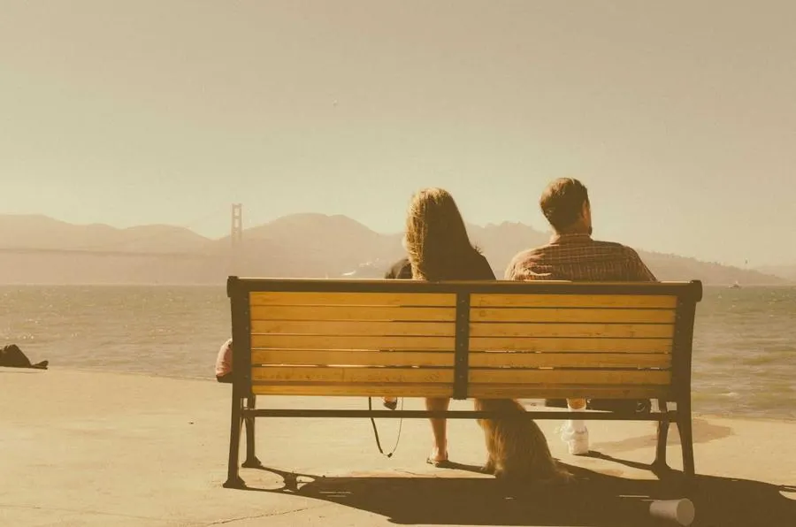 The two of us on a bench by the water