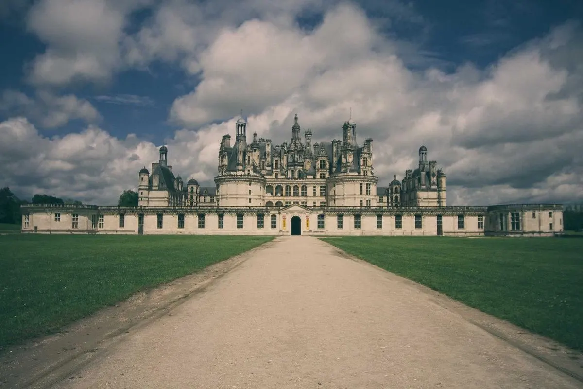The château and its gardens from the long drive