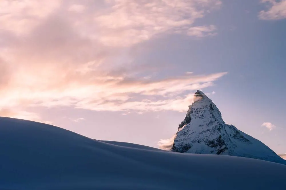 The Matterhorn above a snow field at dawn